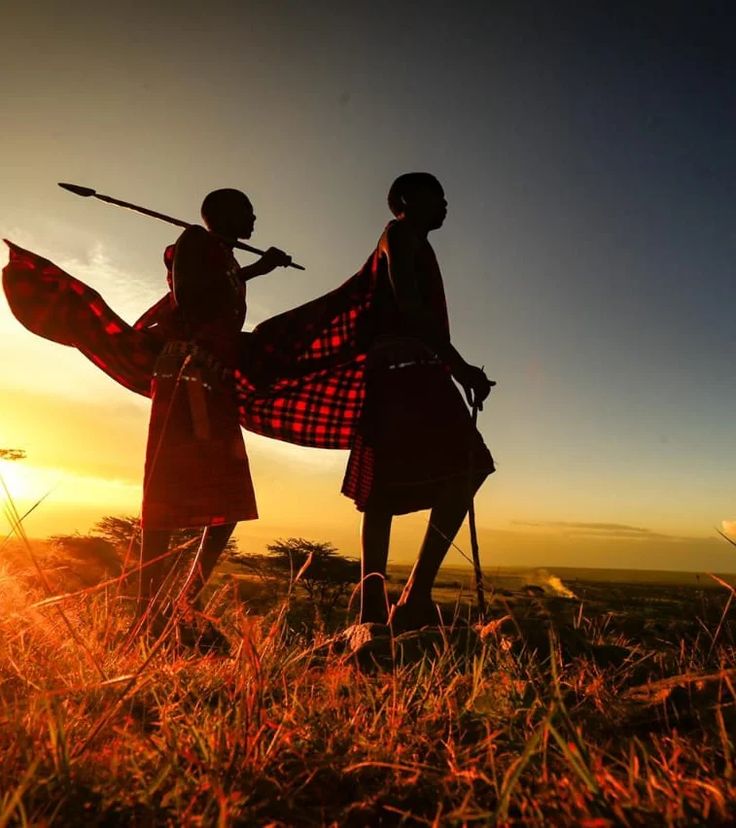 masai morans at evening in the masai mara safari packages
